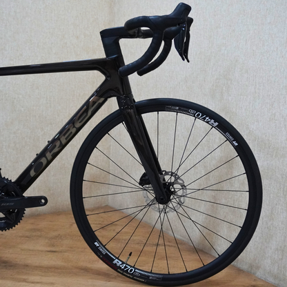 Orbea Orca M31eTEAM - Raw Carbon-Titanium (Gloss) 105 Di2