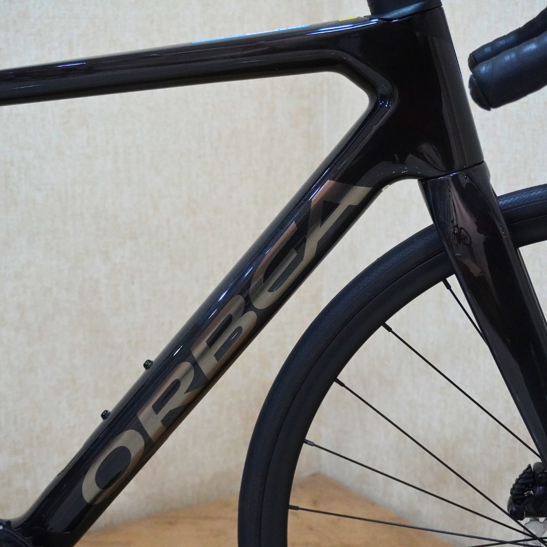 Orbea Orca M31eTEAM - Raw Carbon-Titanium (Gloss) 105 Di2